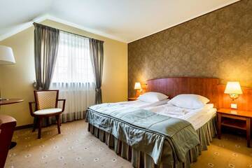 Фото номера Стандартный двухместный номер с 2 отдельными кроватями Отель Hotel Krzyski г. Тарнув 2